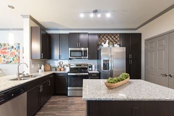 42" Maple cabinetry throughout